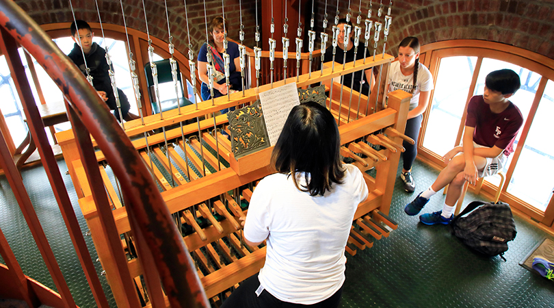 Chimesmaster performs on the 21-bell chime at Cornell University