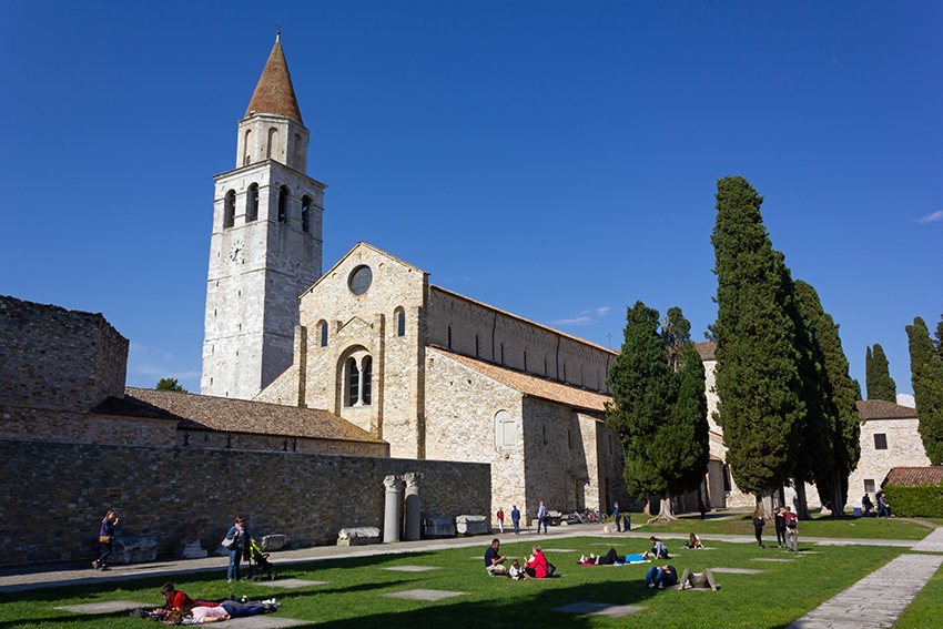 Bells ring from the campanile of the Basilica di Santa Maria Assunta in Aquileia, Italy