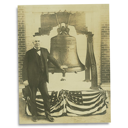 Thomas Edison poses with the Liberty Bell in San Francisco